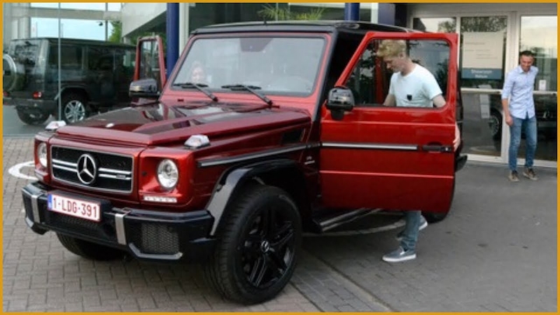 Kevin De Bruyne with his red Mercedes G63 AMG